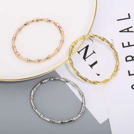 Steel color concealed buckle bamboo link bracelet with high rise polished knots