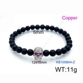 Stretchable 6mm Black Matte Onyx Bracelet Silver Plated Copper Skull Charm With Rhinestones