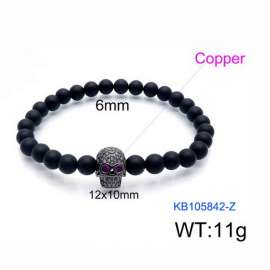 Stretchable 6mm Black Matte Onyx Bracelet Black Plated Copper Skull Charm With Rhinestones