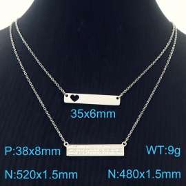 Two piece set of steel colored stainless steel necklace with rectangular long pendant and hollow heart shaped long pendant